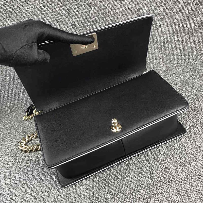 chanel women leboy flap bag in Di*m*nd pattern calfskin leather with top handle-black