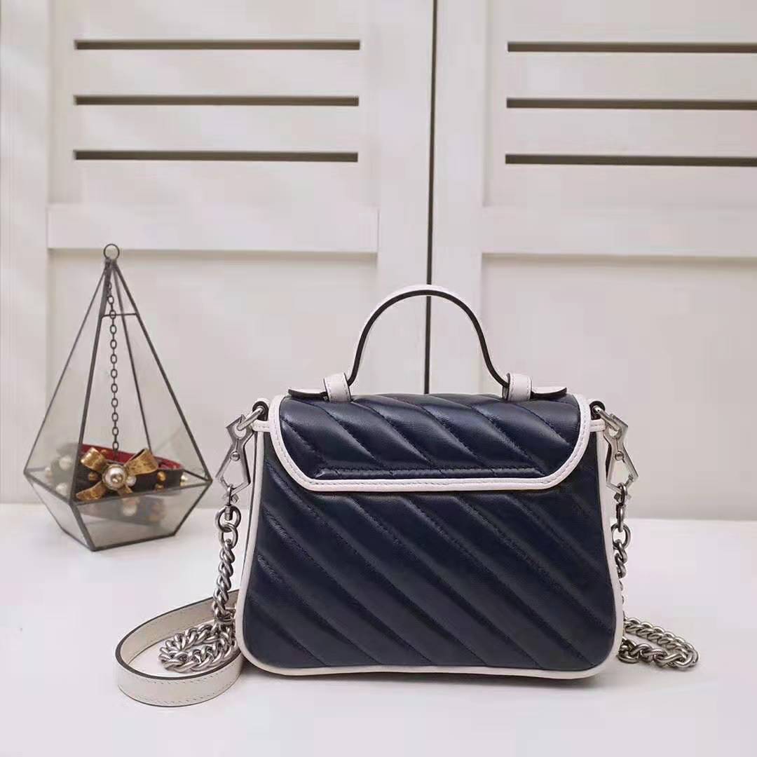 G*u*i gg women gg marmont mini top handle bag in blue diagonal matelassé leather