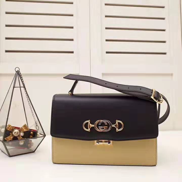 G*u*i gg women G*u*i zumi smooth leather small shoulder bag in black and beige smooth leather