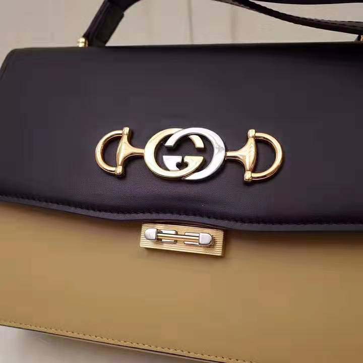 G*u*i gg women G*u*i zumi smooth leather small shoulder bag in black and beige smooth leather
