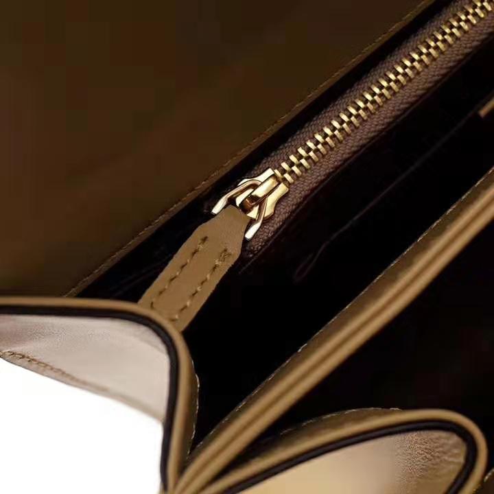 G*u*i gg women G*u*i zumi smooth leather small shoulder bag in black and beige smooth leather