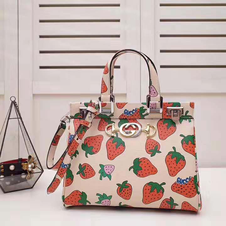 G*u*i gg women G*u*i zumi strawberry print medium top handle bag in G*u*i strawberry print ivory leather