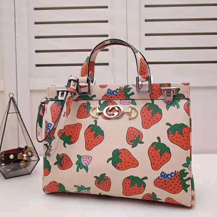 G*u*i gg women G*u*i zumi strawberry print medium top handle bag in G*u*i strawberry print ivory leather