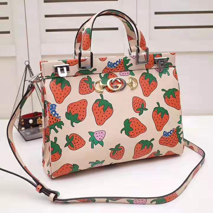 G*u*i gg women G*u*i zumi strawberry print medium top handle bag in G*u*i strawberry print ivory leather