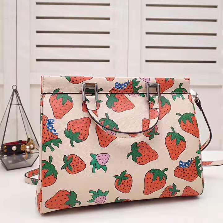 G*u*i gg women G*u*i zumi strawberry print medium top handle bag in G*u*i strawberry print ivory leather