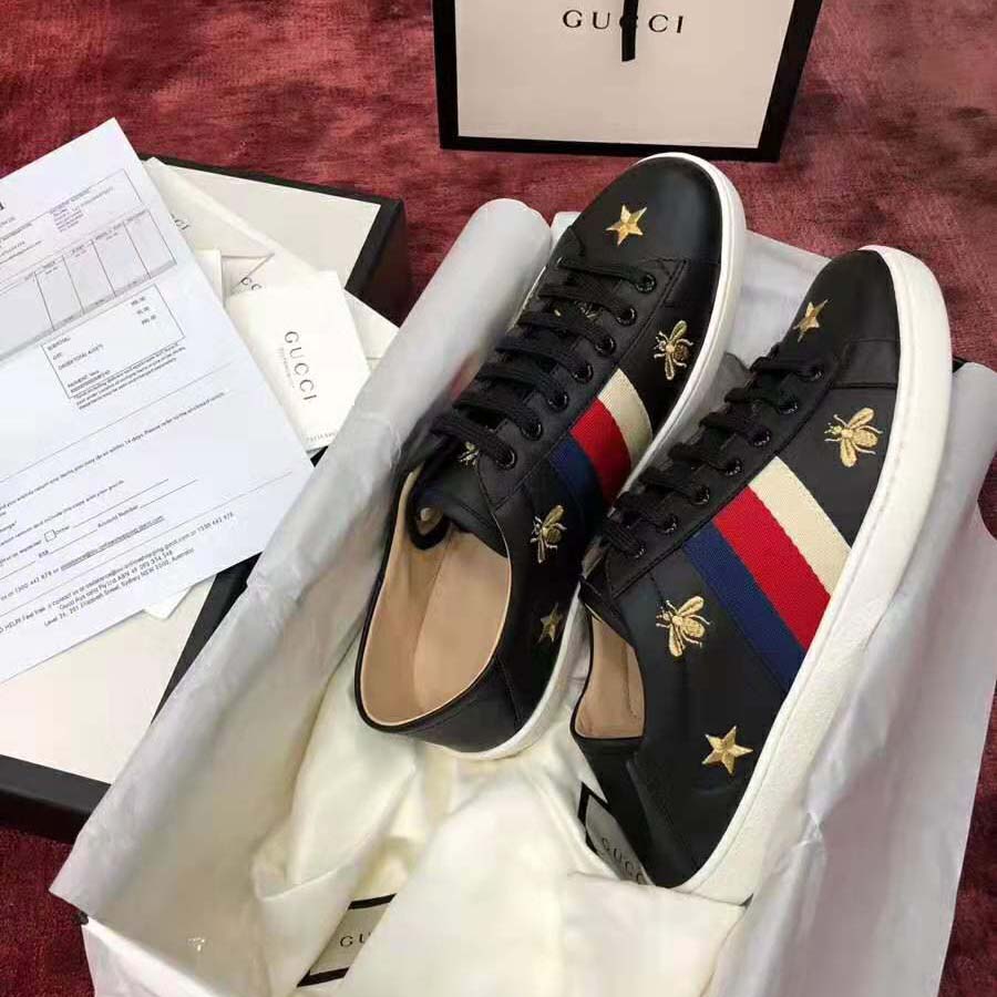 G*u*i men’s ace embroidered sneaker in black leather with bees and stars