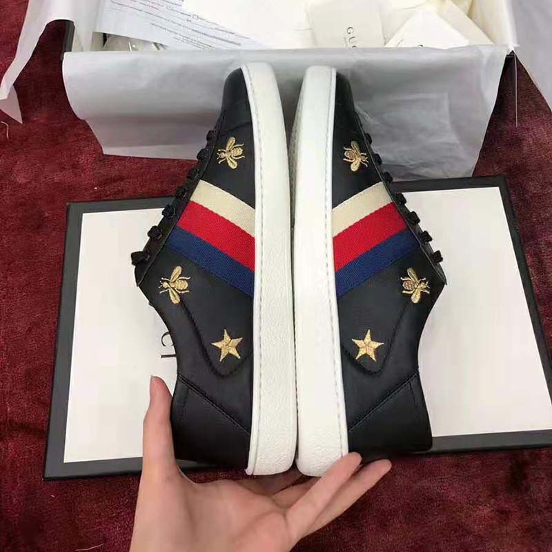 G*u*i men’s ace embroidered sneaker in black leather with bees and stars