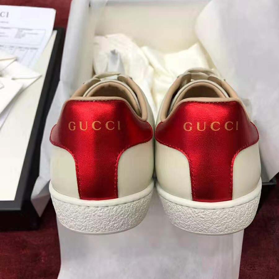 G*u*i unisex ace sneaker with G*u*i stripe in white leather rubber sole
