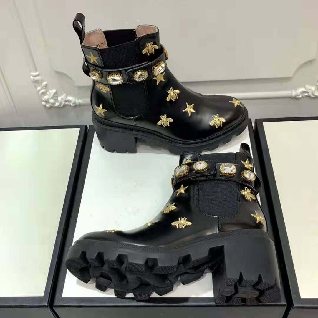 G*u*i women G*u*i embroidered leather ankle boot with belt in black leather 6 cm heel