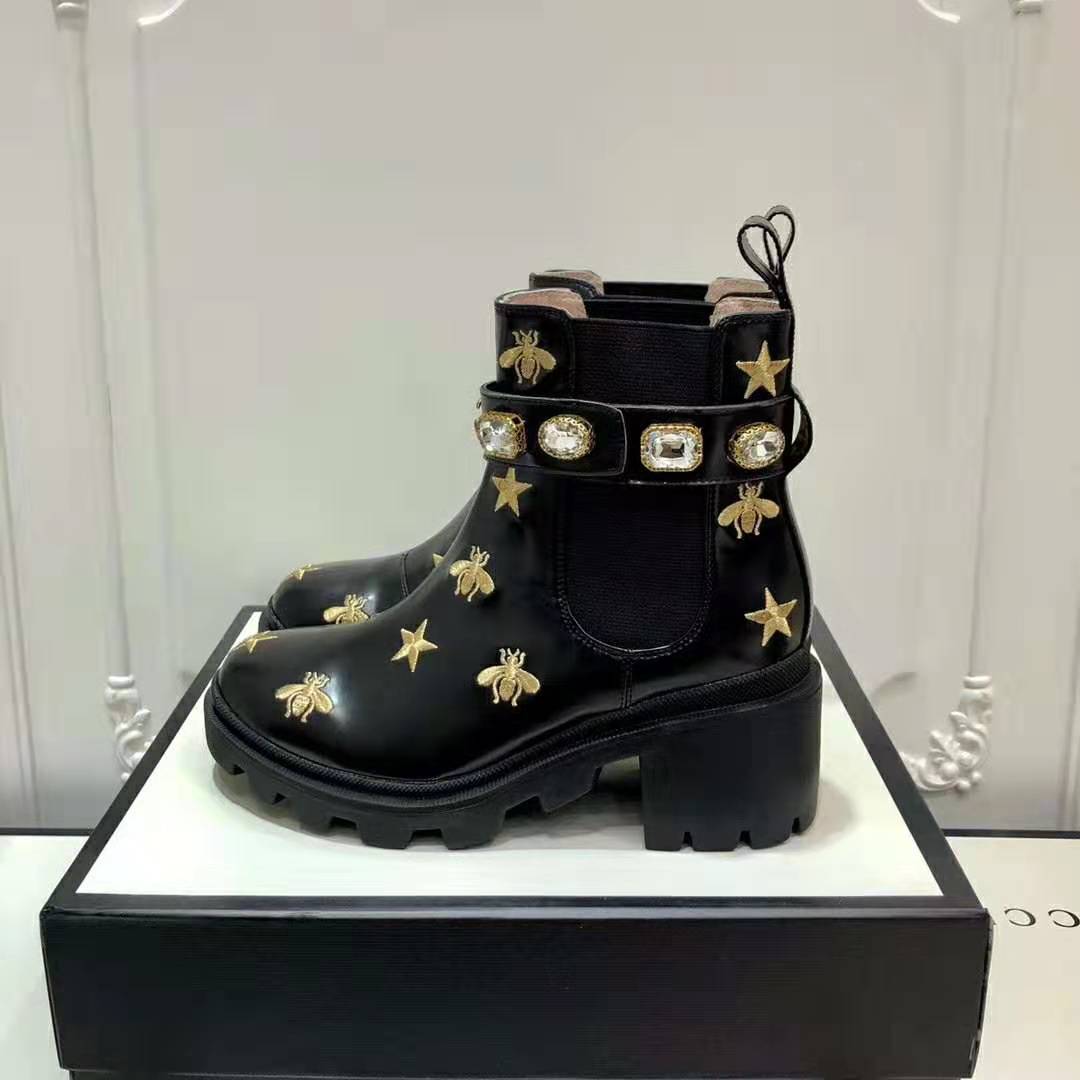 G*u*i women G*u*i embroidered leather ankle boot with belt in black leather 6 cm heel