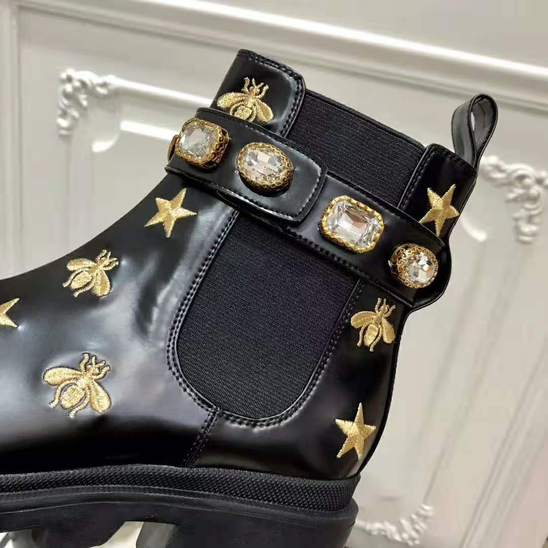 G*u*i women G*u*i embroidered leather ankle boot with belt in black leather 6 cm heel