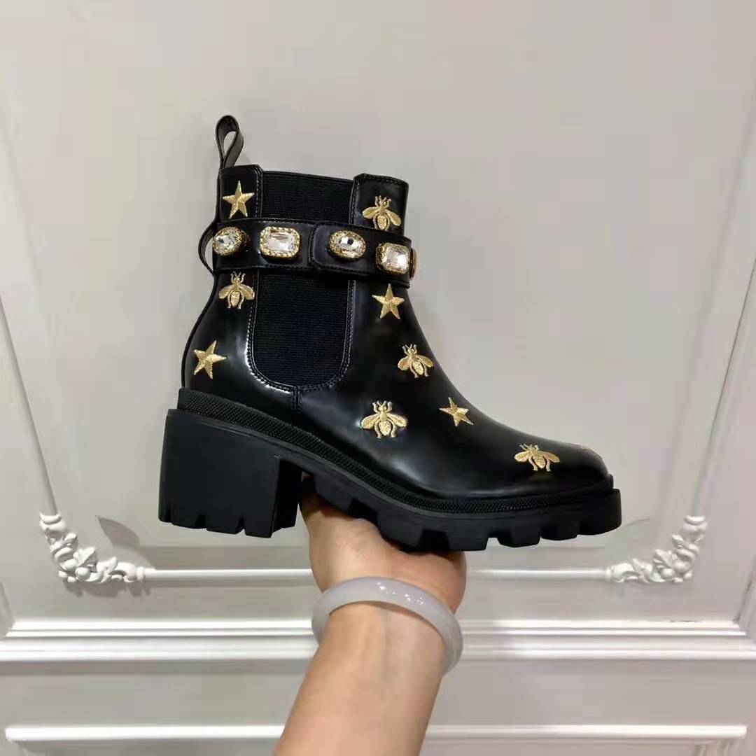 G*u*i women G*u*i embroidered leather ankle boot with belt in black leather 6 cm heel