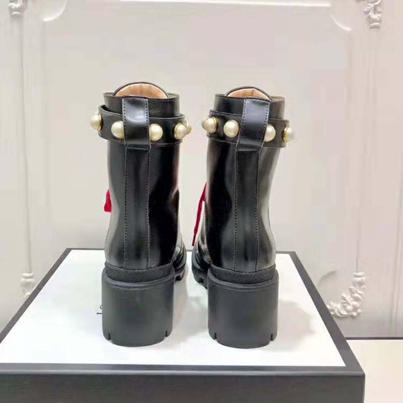 G*u*i women G*u*i leather ankle boot in black shiny leather 7.6 cm