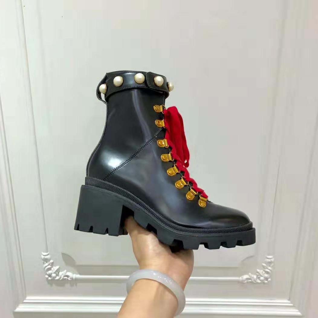 G*u*i women G*u*i leather ankle boot in black shiny leather 7.6 cm