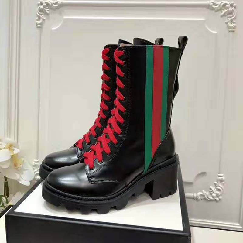 G*u*i women G*u*i leather ankle boot with web in black shiny leather 4.8 cm heel