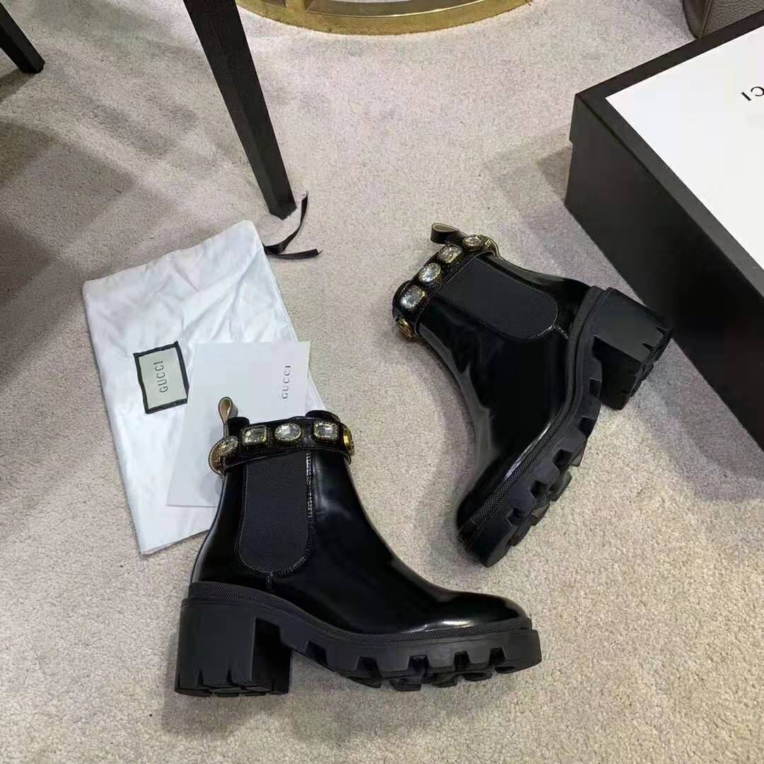 G*u*i women leather ankle boot with belt 6 cm heel in black shiny leather