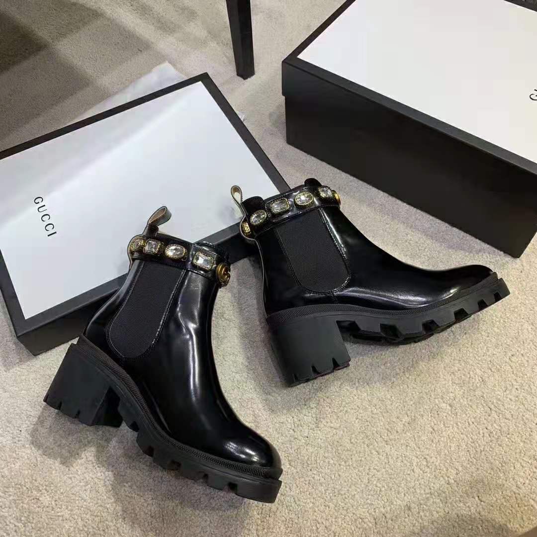 G*u*i women leather ankle boot with belt 6 cm heel in black shiny leather