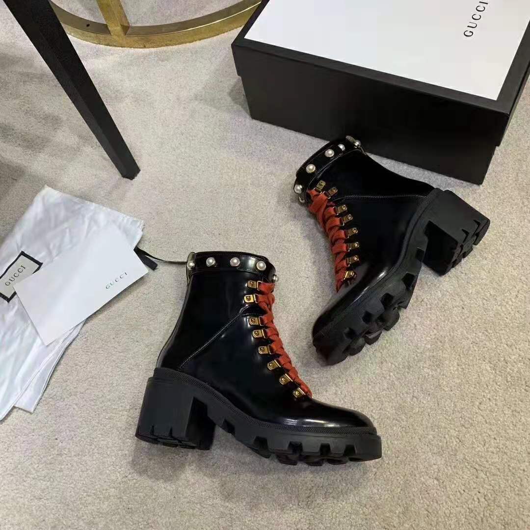 G*u*i women leather ankle boot with red laces in black shiny leather