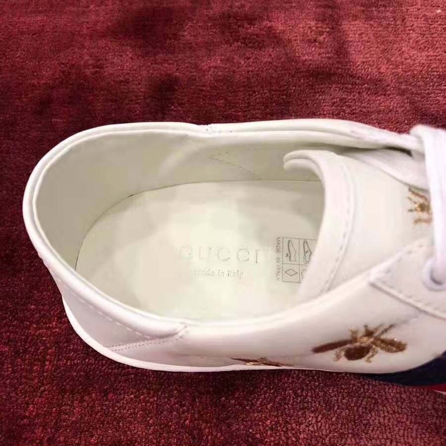 G*u*i women’s ace embroidered sneaker in white leather with bees and stars