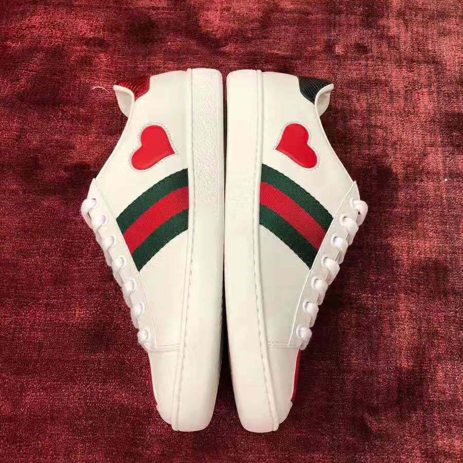 g*u*i women’s ace embroidered sneaker with two leather He**ts in rubber sole-white