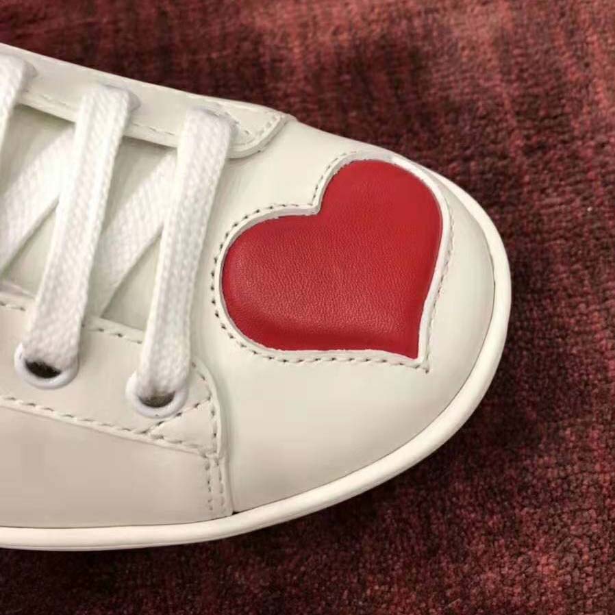 g*u*i women’s ace embroidered sneaker with two leather He**ts in rubber sole-white