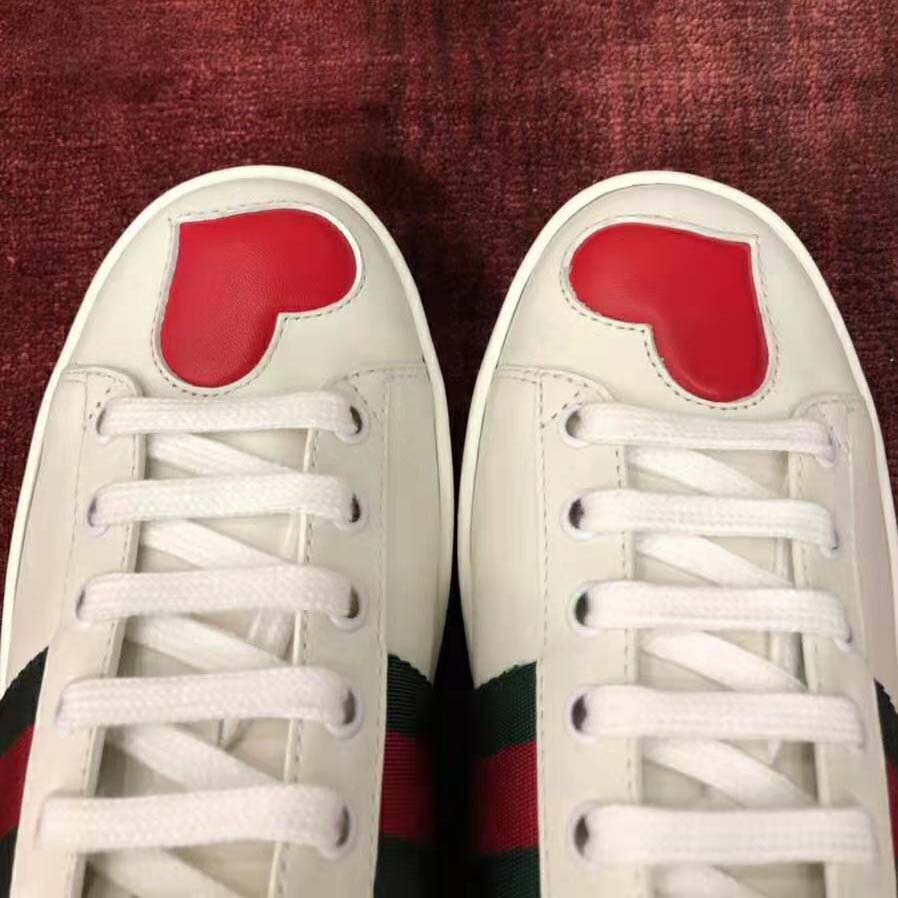g*u*i women’s ace embroidered sneaker with two leather He**ts in rubber sole-white