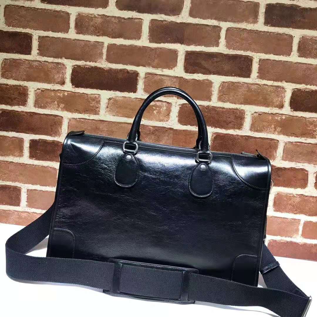 G*u*i gg men medium soft leather duffle in black soft leather
