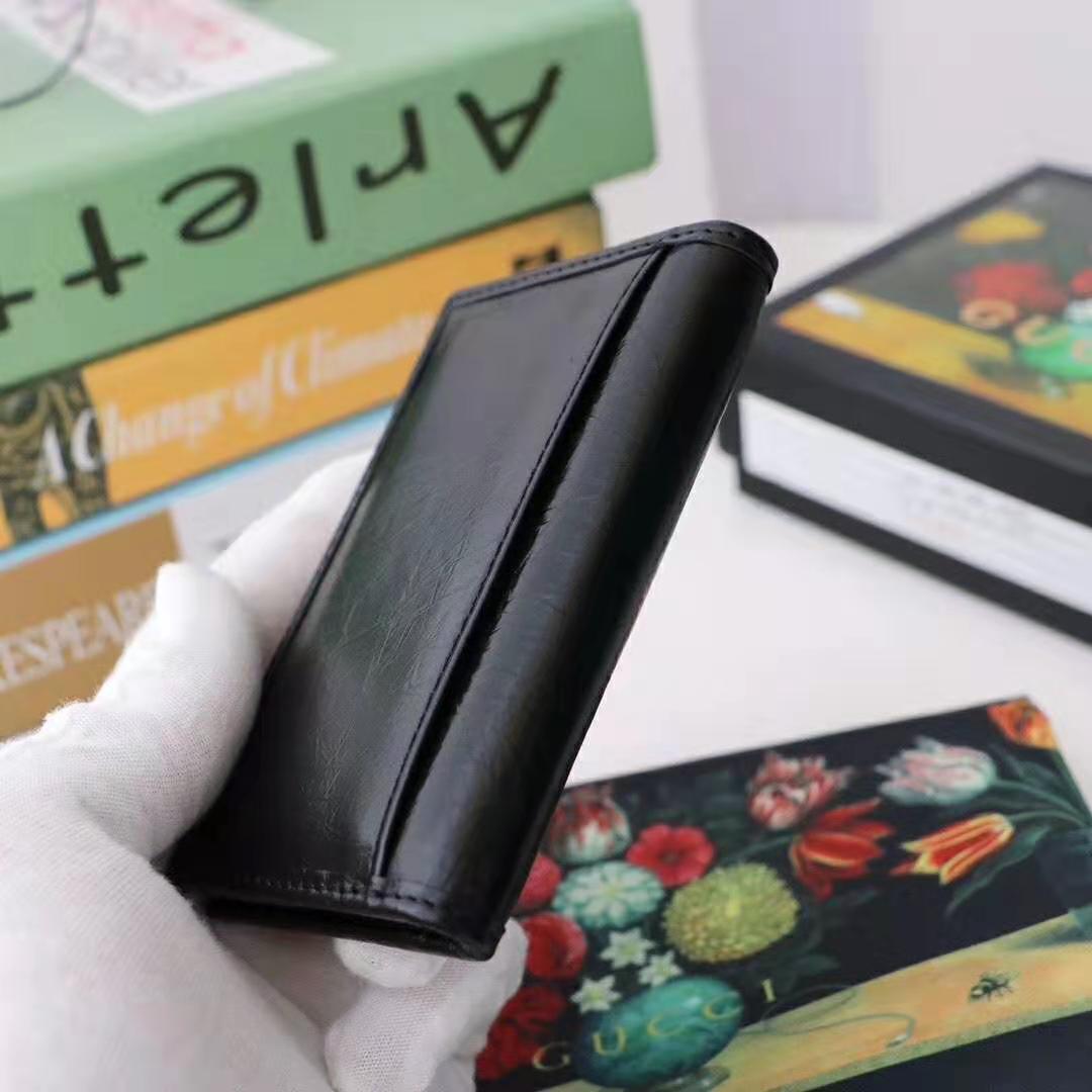G*u*i gg men soft leather passport case in black soft leather
