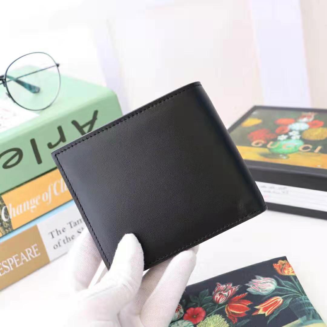 G*u*i gg unisex leather wallet with G*u*i logo in black leather