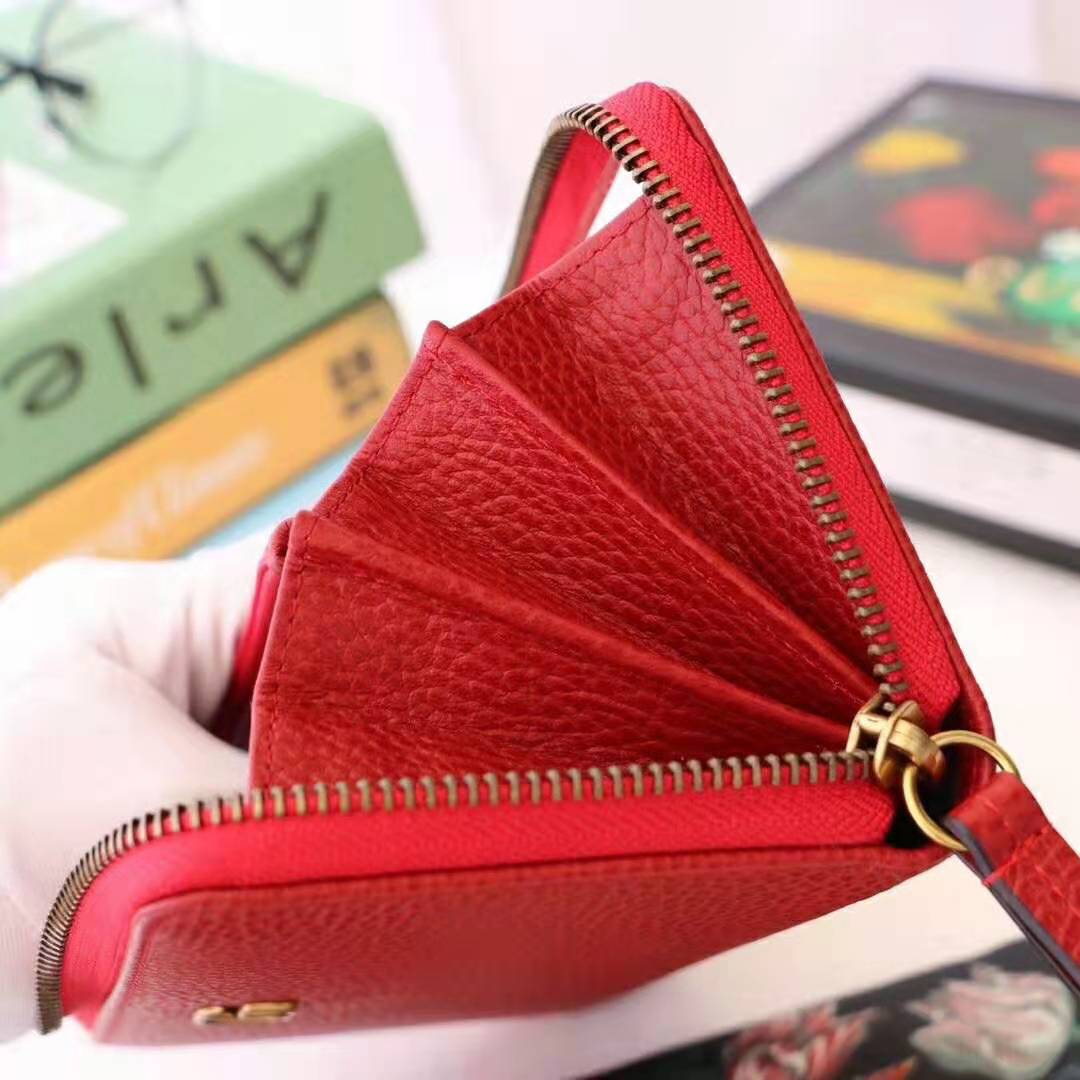 G*u*i gg unisex leather zip around wallet in hibiscus red leather