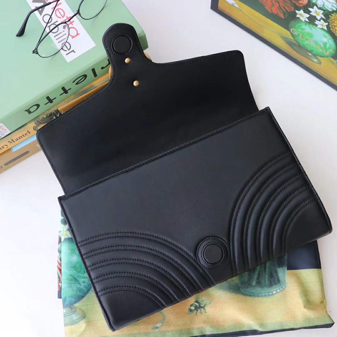 G*u*i gg women gg marmont clutch in black matelassé chevron leather with a heart
