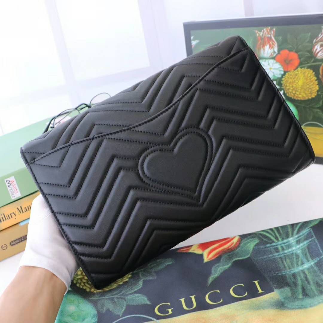 G*u*i gg women gg marmont clutch in black matelassé chevron leather with a heart
