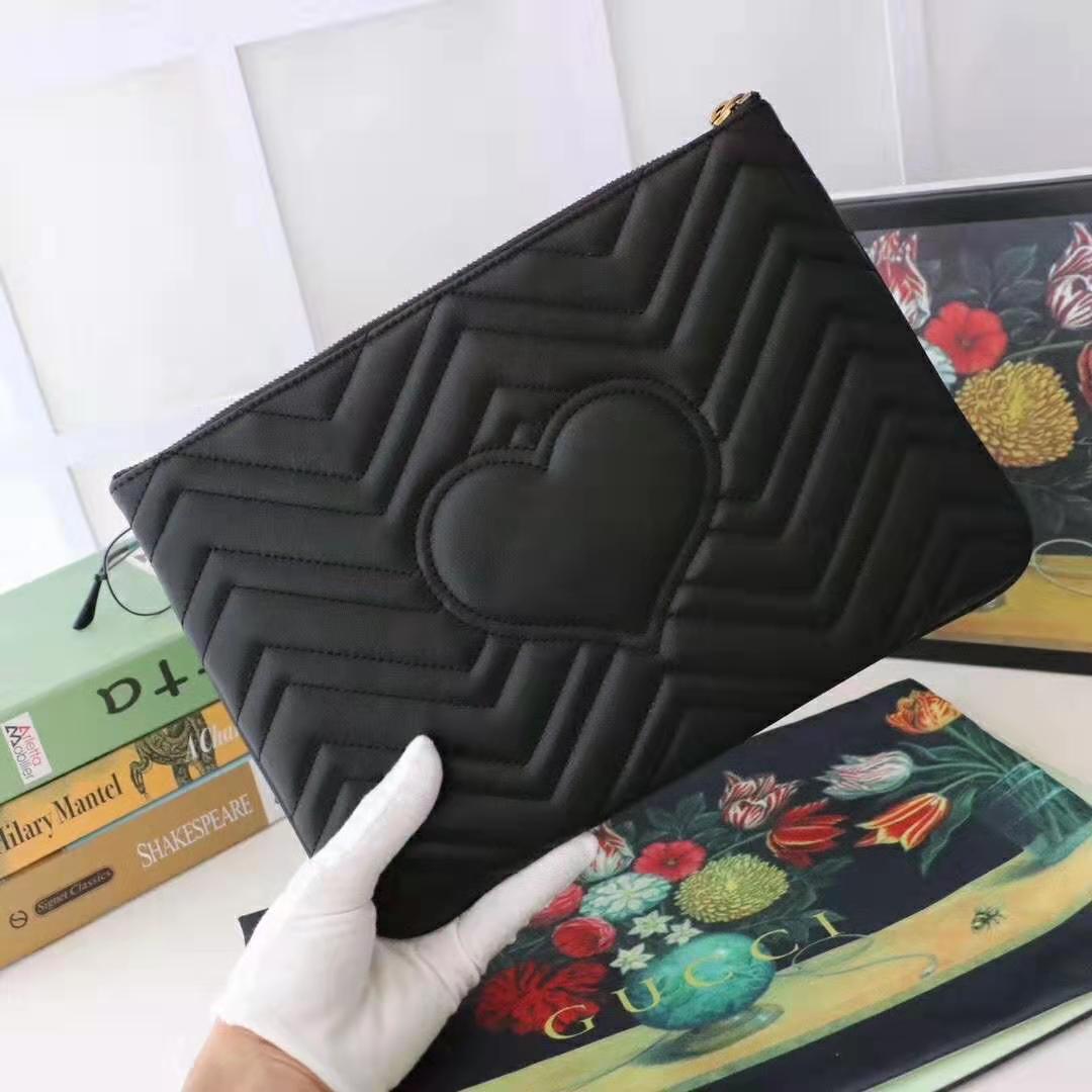 G*u*i gg women gg marmont leather pouch in black matelassé chevron leather with heart