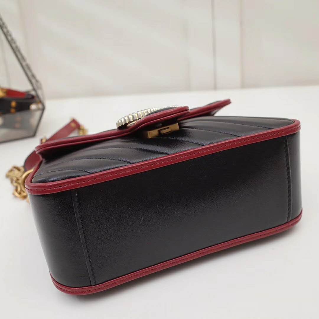 G*u*i gg women gg marmont mini top handle bag in black diagonal matelassé leather