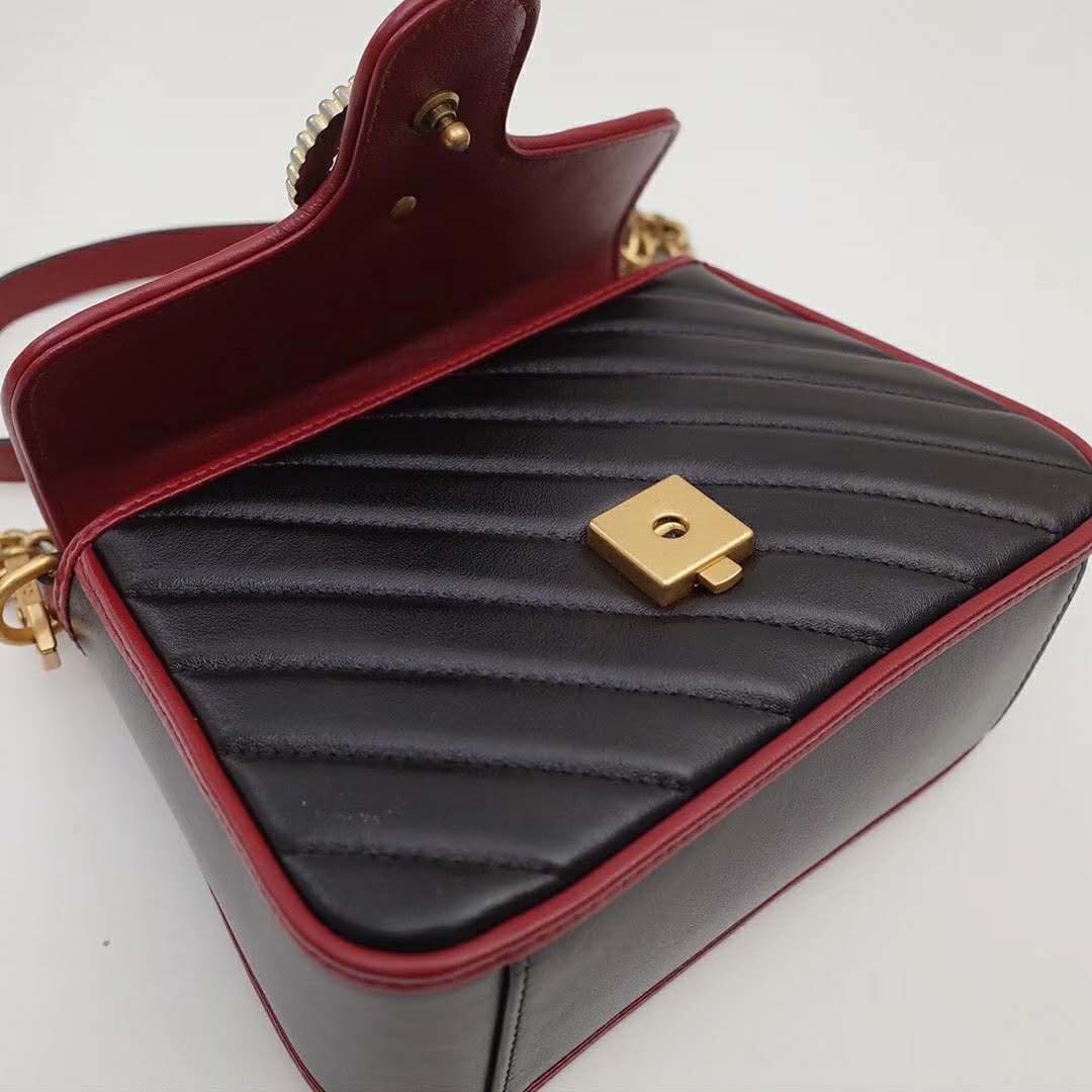G*u*i gg women gg marmont mini top handle bag in black diagonal matelassé leather