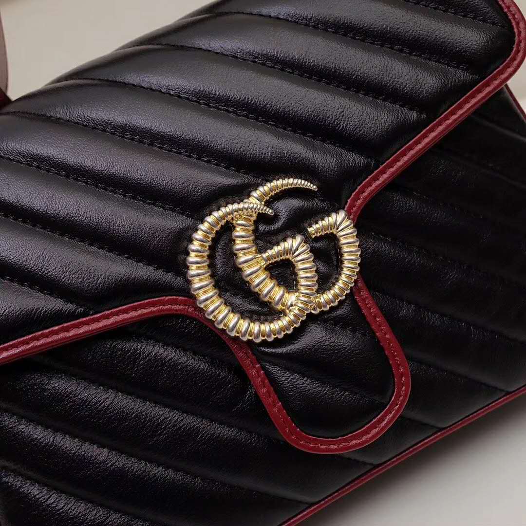 G*u*i gg women gg marmont small top handle bag in black diagonal matelassé leather