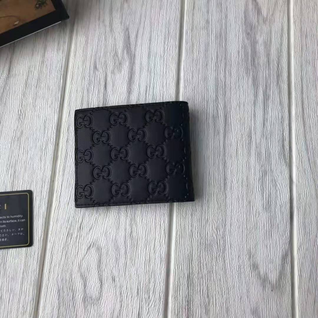 G*u*i gg men G*u*i signature wallet in black G*u*i signature leather with details