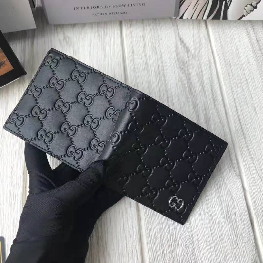 G*u*i gg men G*u*i signature wallet in black G*u*i signature leather with details