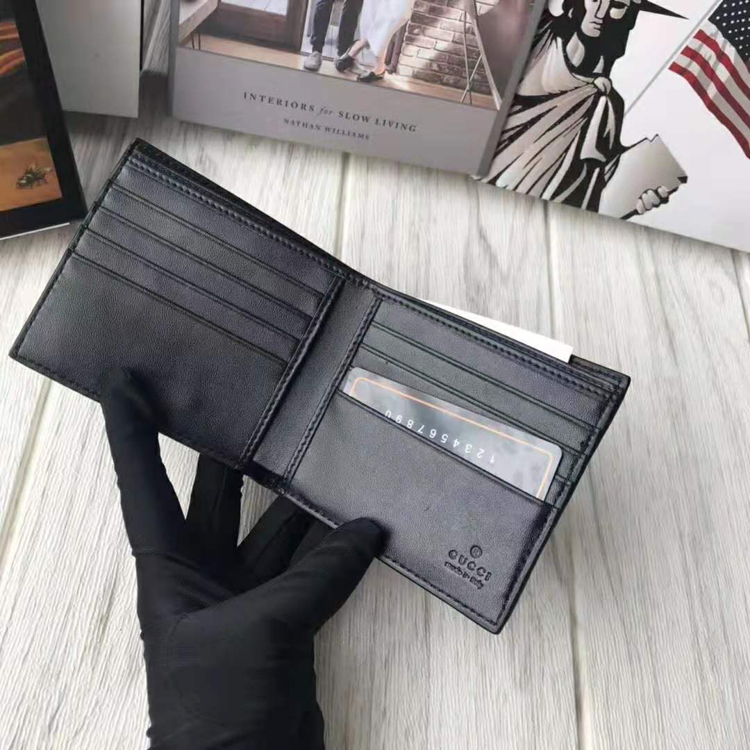 G*u*i gg men G*u*i signature wallet in black G*u*i signature leather with details