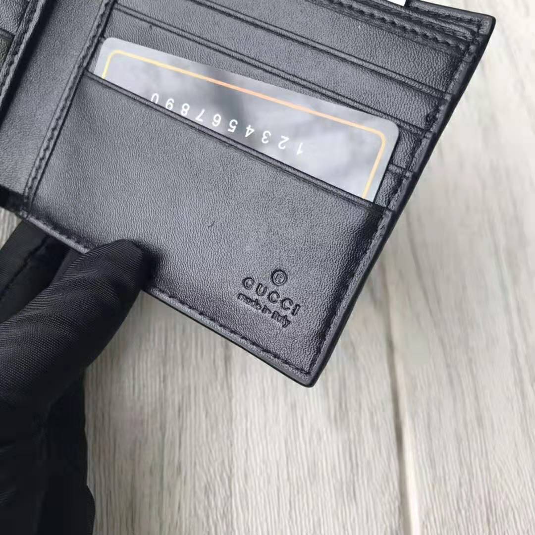 G*u*i gg men G*u*i signature wallet in black G*u*i signature leather with details