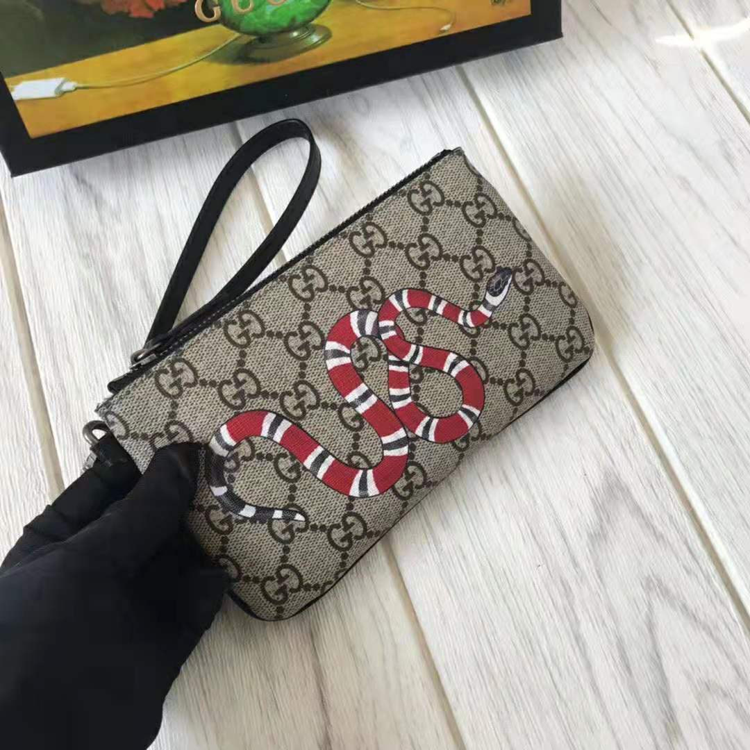 G*u*i gg men kingsnake print gg supreme iphone pouch in beige/ebony gg supreme canvas