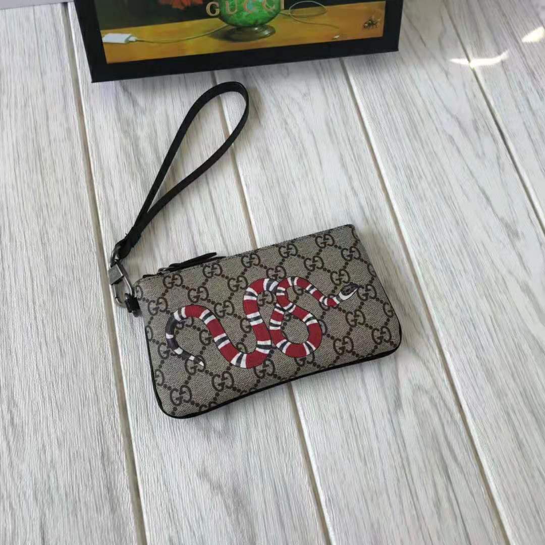 G*u*i gg men kingsnake print gg supreme iphone pouch in beige/ebony gg supreme canvas