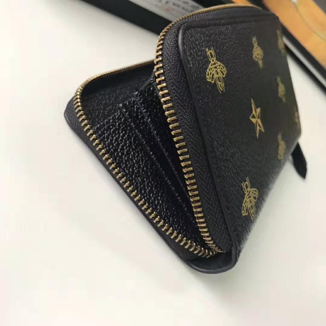 G*u*i gg unisex bee star leather zip around wallet in black metal-free tanned leather