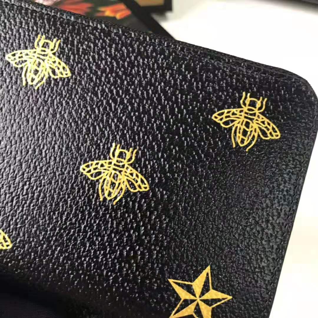 G*u*i gg unisex bee star leather zip around wallet in black metal-free tanned leather