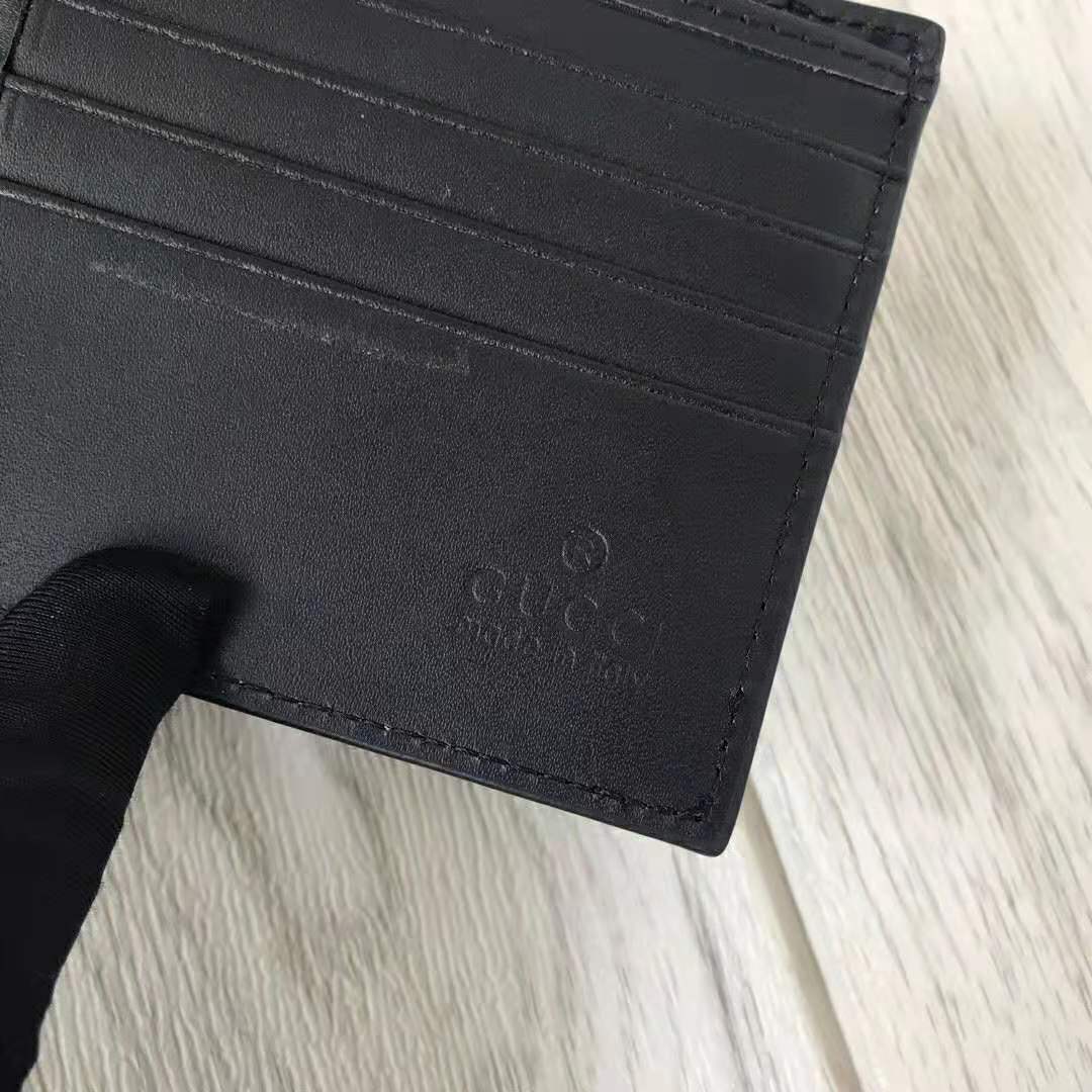 G*u*i gg unisex leather mini wallet with G*u*i logo in black leather