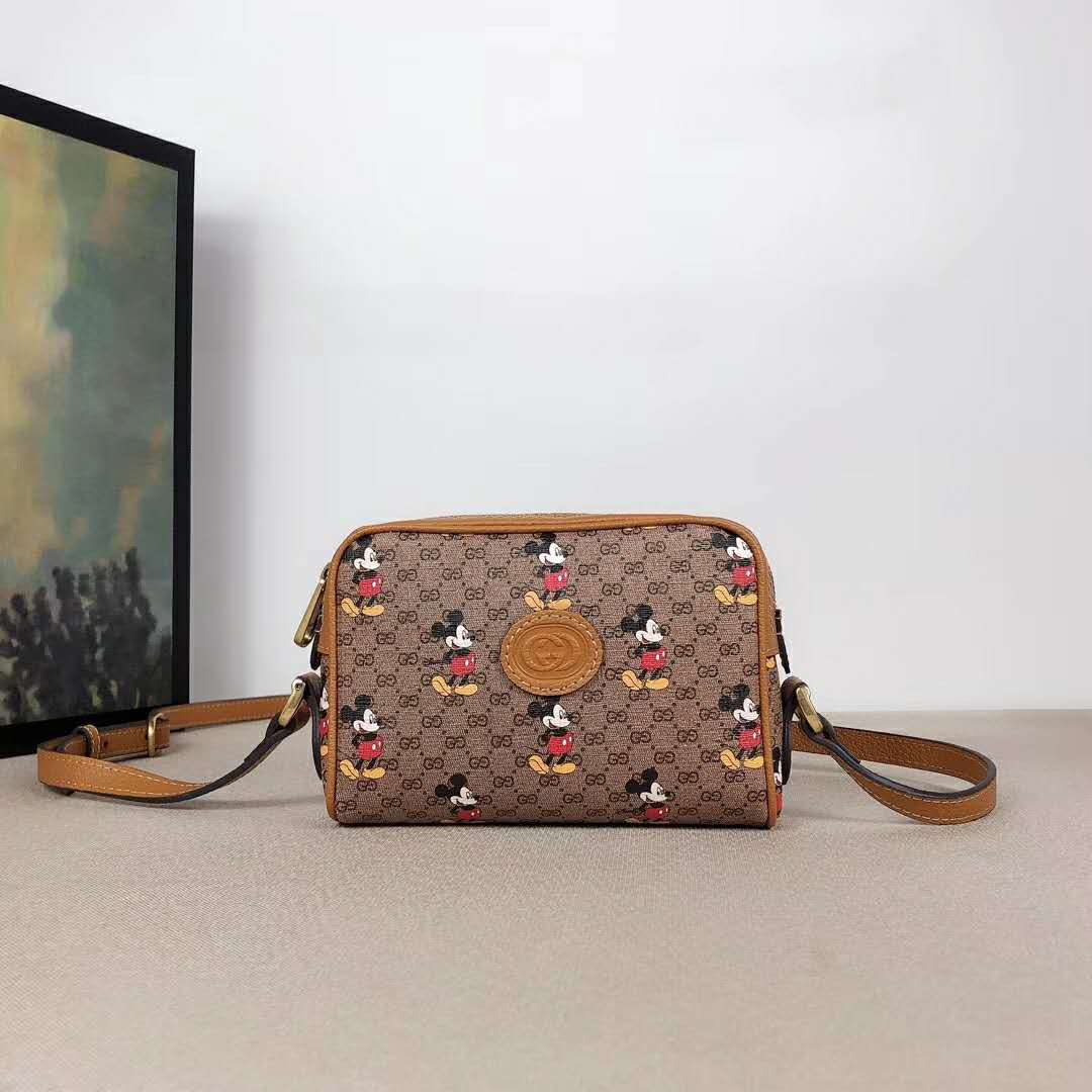 G*u*i gg women disney x G*u*i shoulder bag gg supreme canvas