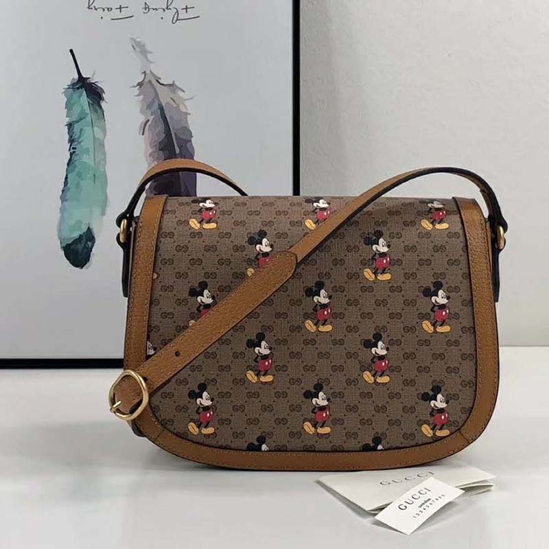 G*u*i gg women disney x G*u*i small shoulder bag gg supreme canvas