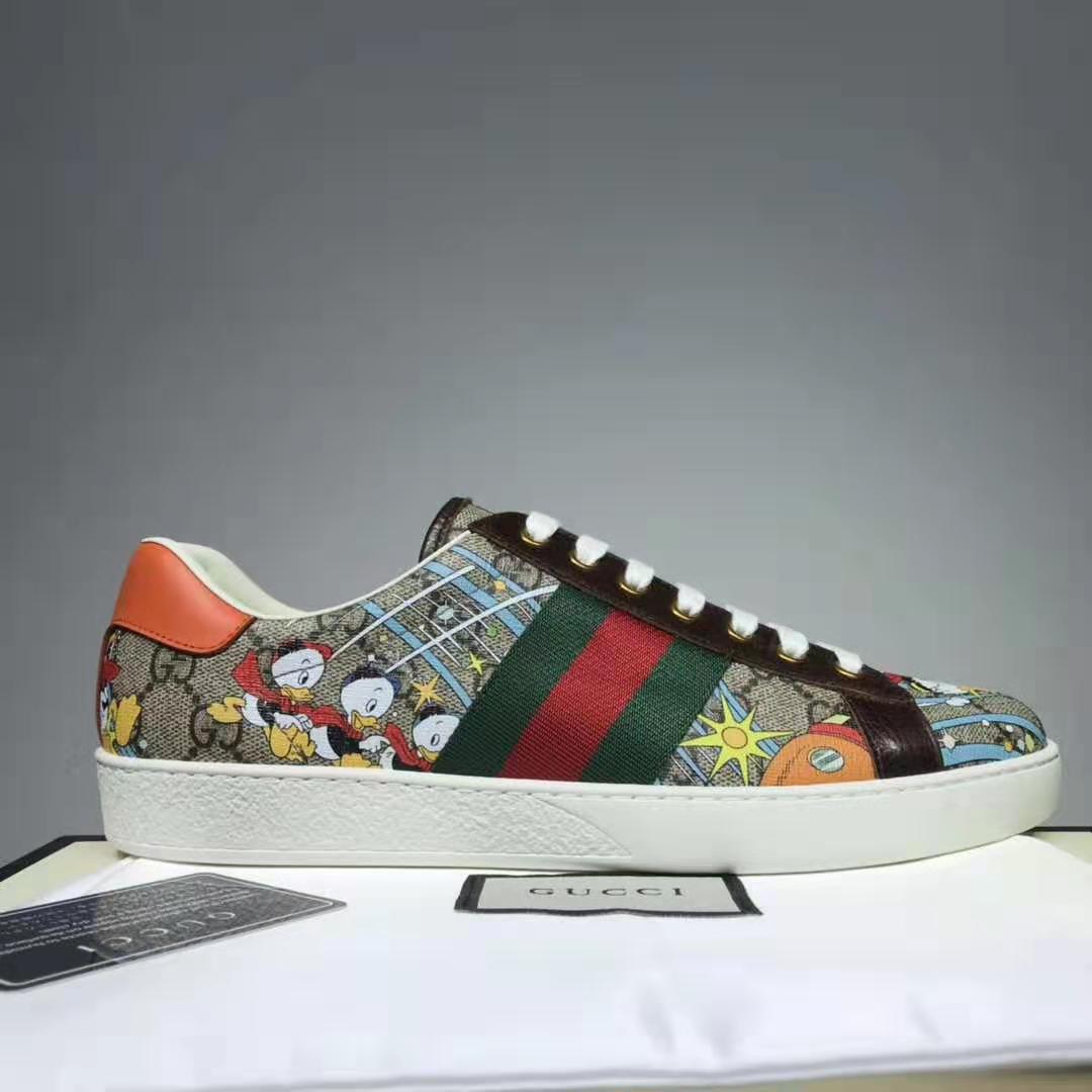 G*u*i gg unisex disney x G*u*i donald duck ace sneaker beige gg supreme canvas