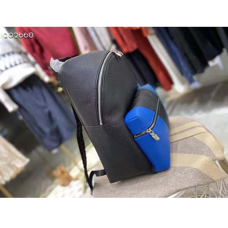 louis vuitton unisex discovery “v” logo backpack blue monoCh*0me taiga leather
