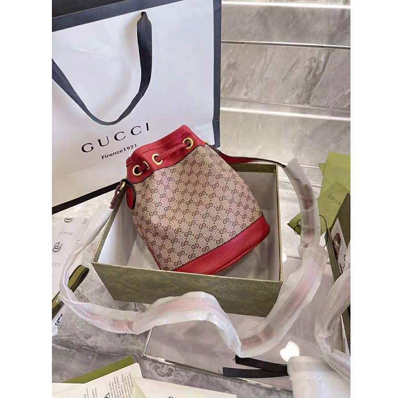 G*u*i women doraemon x G*u*i small bucket bag beigeebony mini gg supreme canvas